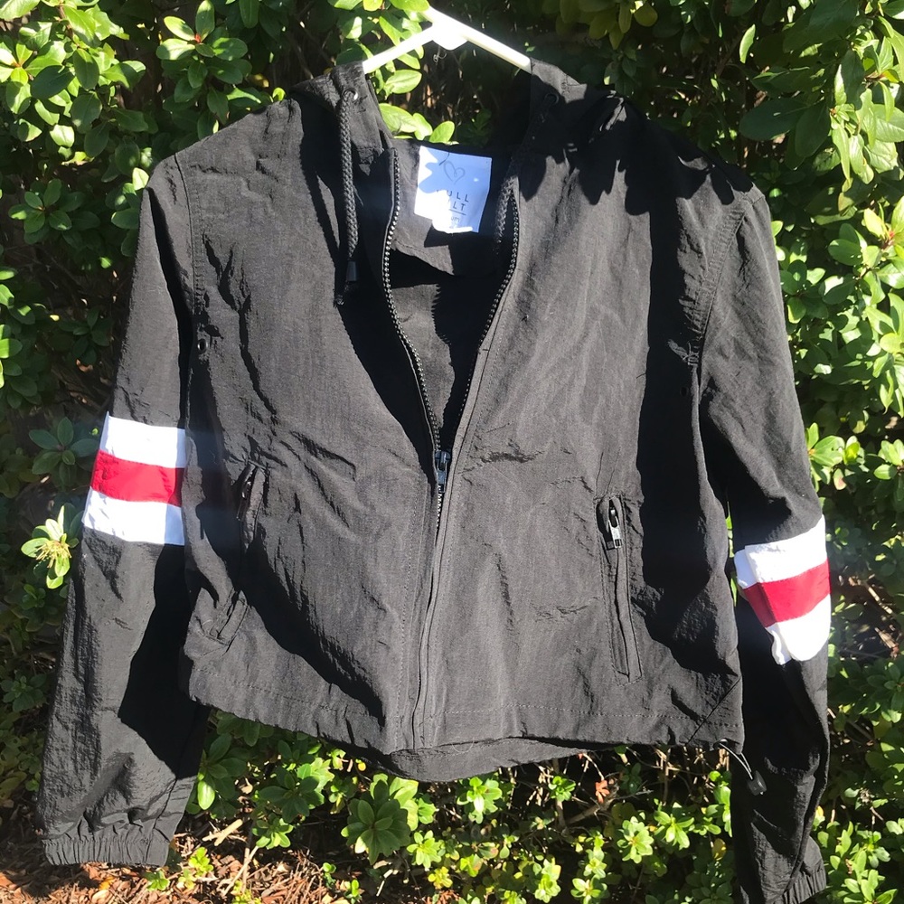 Black and striped sleeve windbreaker